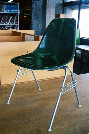 Green molded fibreglass chair